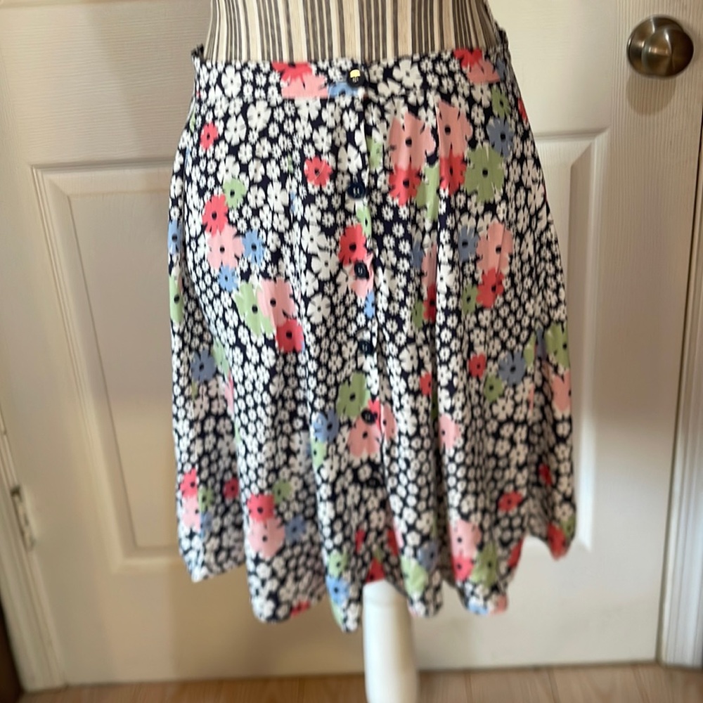 Defects brand floral mini skirt
